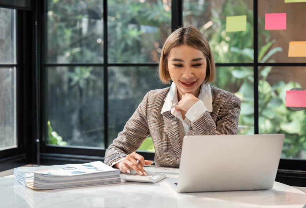 An accountant working using an accounting software.