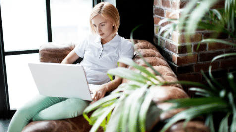 Woman on laptop is your company outgrowing your freelancer